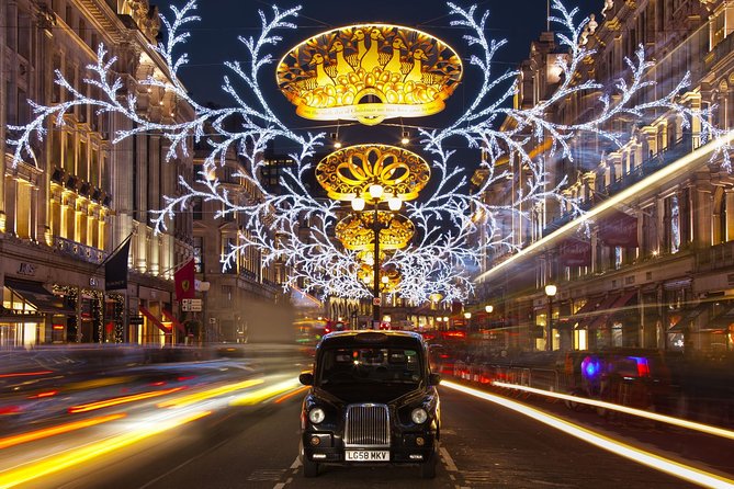 London by Night Bus Tour with Christmas Lights and Live Guide - The Strand and its flying fairy lights