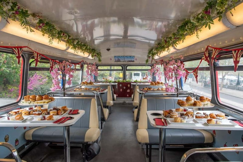 London: Great British Afternoon Tea Bus Tour - Afternoon tea with London moving past the window