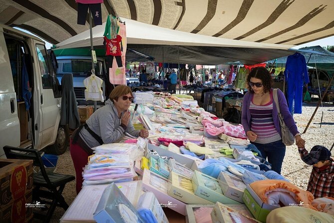 Loulé Market and Town Half-Day Bus Round Trip from Albufeira - Booking, weather, and cancellation details