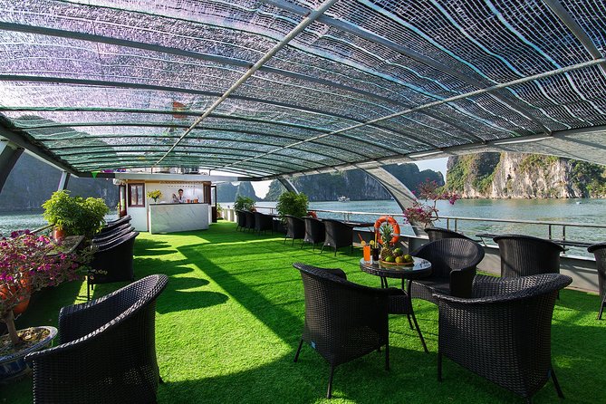 Luxury Halong Bay 1 Day on Cruises From Hanoi with Bus & Lunch - Titov Island, swimming, and views from the shore