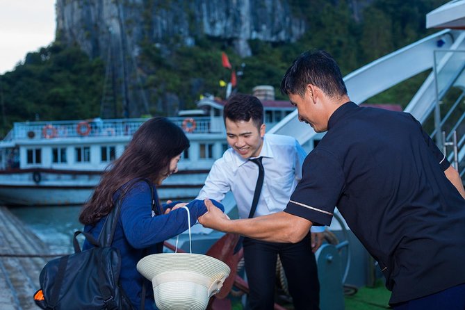 Luxury Halong Bay 1 Day on Cruises From Hanoi with Bus & Lunch - Sunset cake and fruit on the sundeck