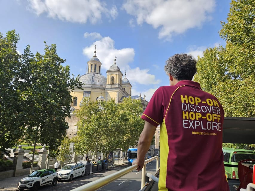 Madrid: Open-Top Big Bus Sightseeing Tour with Live Guide - What the live bilingual guide adds