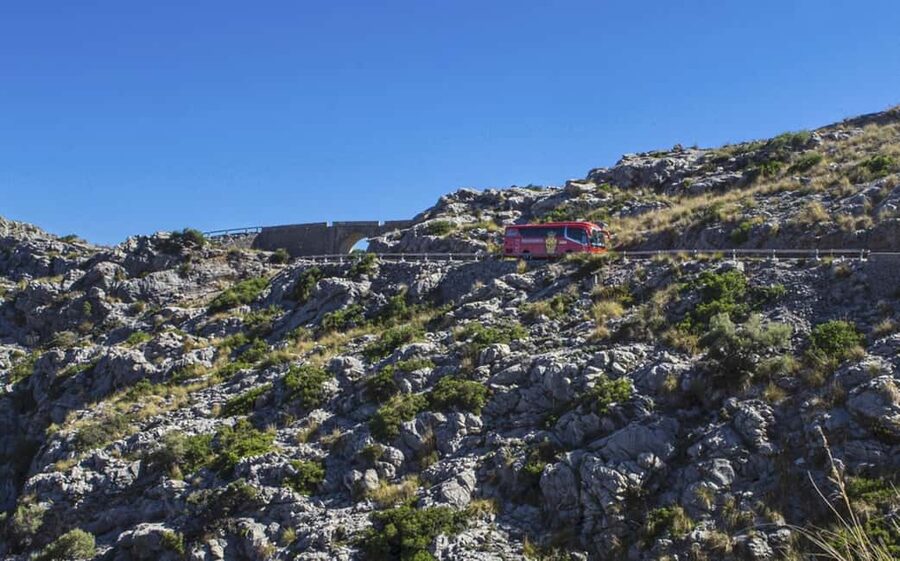 Mallorca Island Tour with Boat, Train, Tram and Bus - The boat turns the mountains into a coastal view
