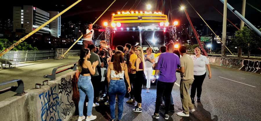 Medellin: Rumbero Party Bus with all the beer you can drink - Puente de la 4 Sur under the lights