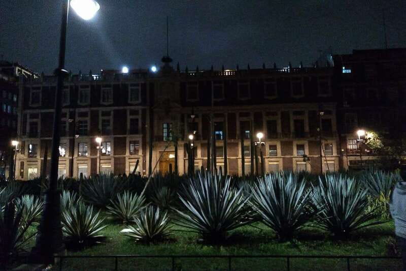 Mexico City: Double Decker Bus Night Tour - Palace of Fine Arts under evening lights