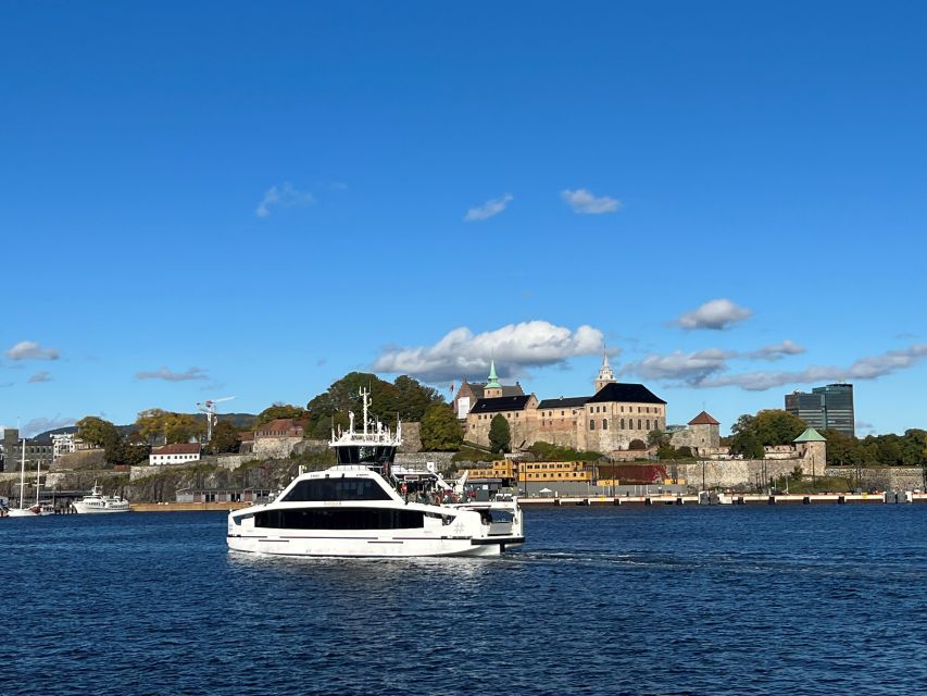 Oslo: Guided Oslo Highlights Tour by bus & Oslofjord cruise - Holmenkollen delivers the big view