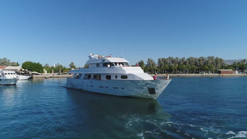 Paphos: Adults Only Cruise with Drinks, Food, Bus, Swim Stop - Hotel pickup sets an easy pace