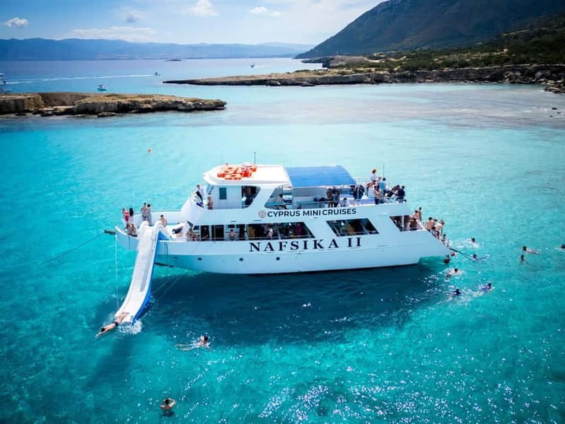 Paphos/Akamas: Blue Lagoon Bus & Boat Tour with Water Slide - Lunch and free time in Polis