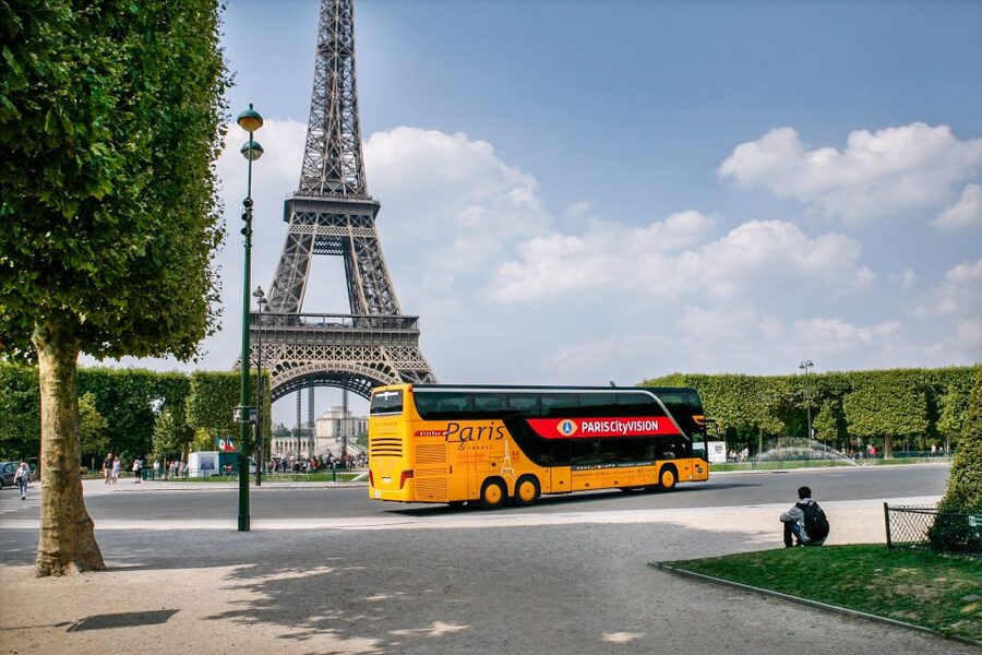 Paris: Audio-Guided Bus Tour & Seine River Cruise - The Seine cruise and its glass-sided trimaran