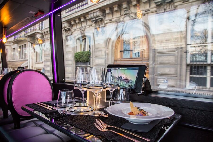 Paris: Champs Elysées Bus Toqué w/Lunch & Glass of Champagne - Audio guide, live languages, and onboard comfort