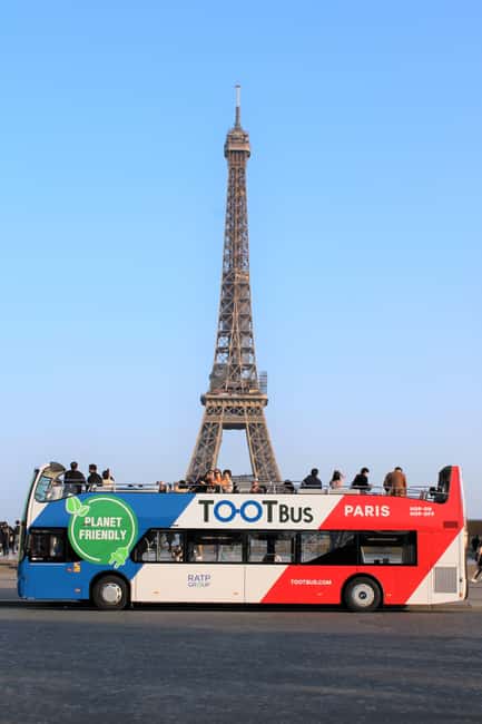 Paris: Hop-on with Emily walking tour and bus tour - Riding the blue line around central Paris