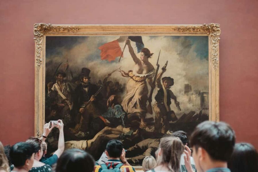 Paris: Louvre Museum Access with Host and Hop-On Hop-Off Bus - Two hours inside a museum built for kings
