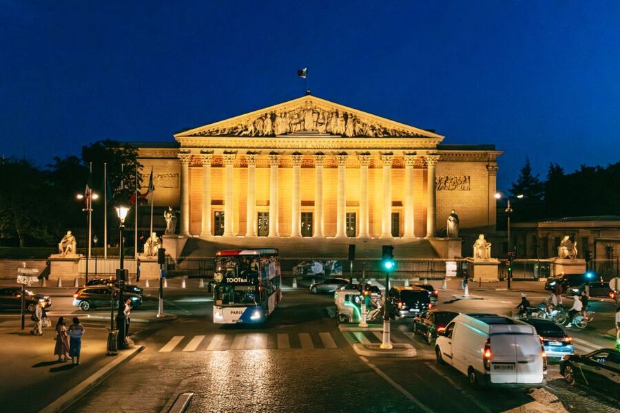 Paris: Tootbus Panoramic by Night Bus Tour with Audioguide - Starting at the Louvre after dark