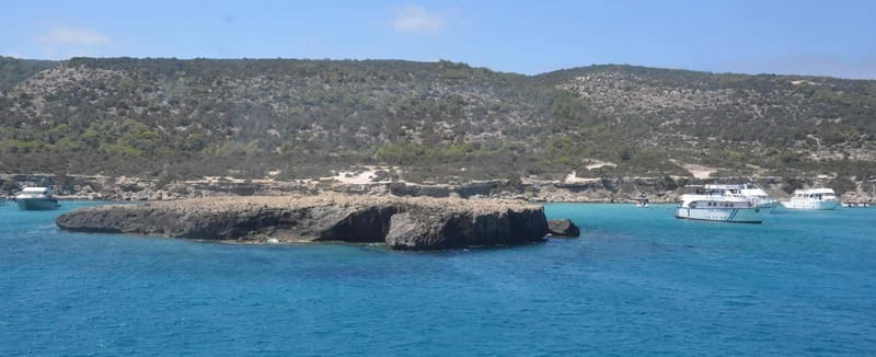 Polis: Blue Lagoon Boat Tour with bus from Paphos - Passing Aphrodite’s Baths