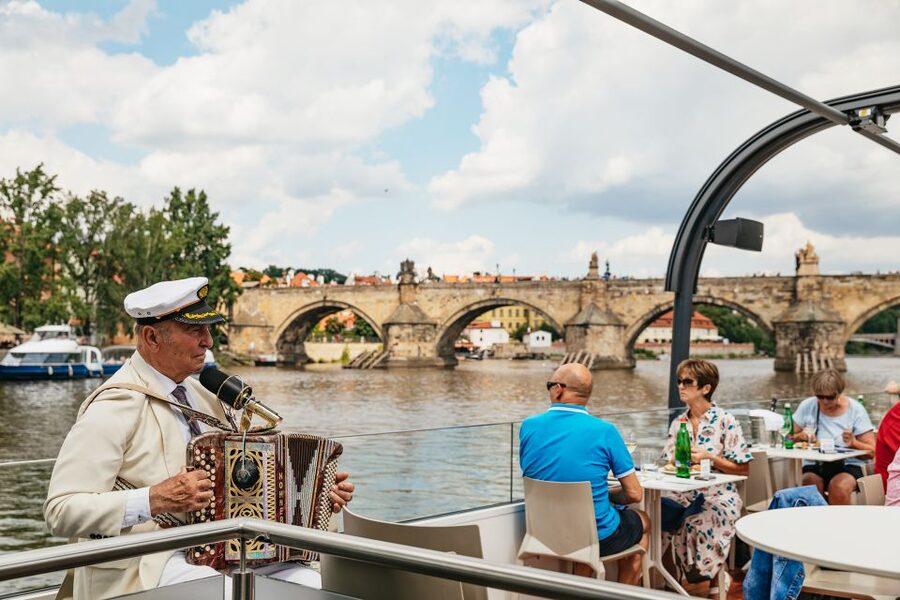 Prague: Vltava River Lunch Cruise in an Open-Top Glass Boat - Live accordion music and the onboard mood