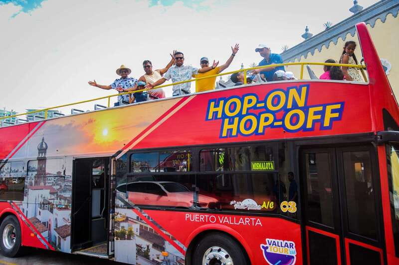 Puerto Vallarta: Hop-On-Hop-Off City Bus Tour - Tequila, souvenirs, and the social side of the ride