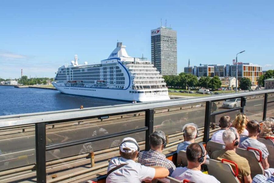 Riga: Red Bus Hop-On Hop-off Sightseeing Grand Tour - Crossing the Daugava through Pardaugava