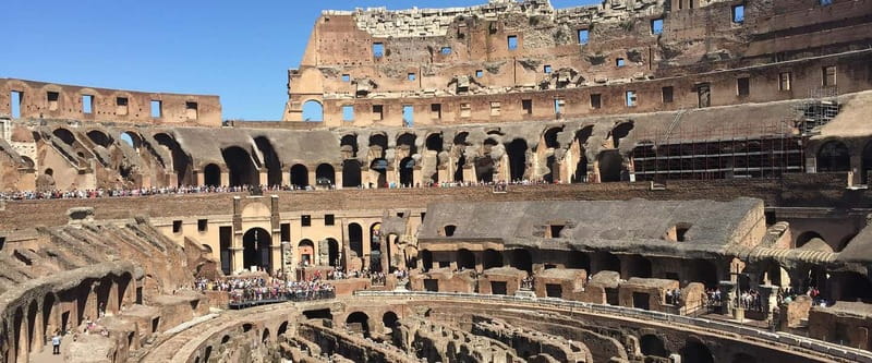Rome: Colosseum, Forum Audio Tour with Hop-on Hop-off Bus - Collecting your ticket near the Colosseum
