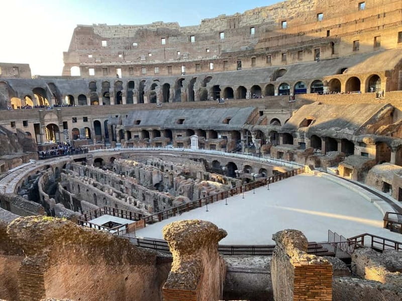 Rome: Colosseum, Forum Audio Tour with Hop-on Hop-off Bus - Entering the Colosseum’s first and second rings