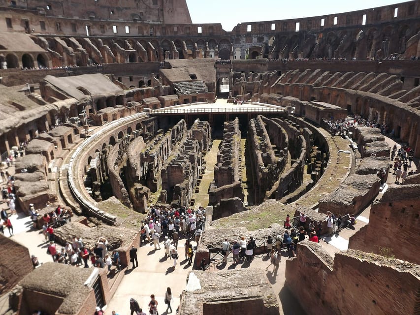 Rome: Hop-on Hop-off Bus Tour and Colosseum Experience - Ancient Rome on foot: Forum and Palatine Hill