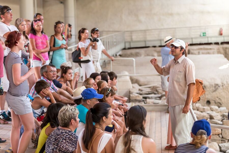 Santorini 2-Day Combo: Volcano Boat Cruise & Island Bus Tour - Day two: Akrotiri, villages, beach, and wine