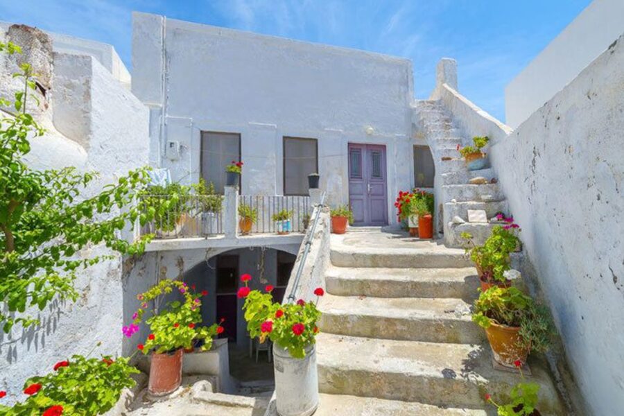 Santorini Island Bus Tour and Caldera Sunset Cruise - Pyrgos brings a quieter village feel