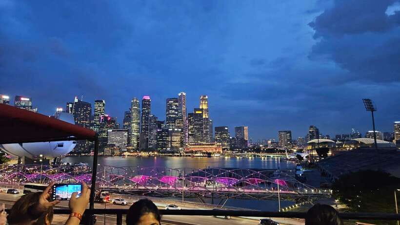 Singapore: Big Bus Night Tour by Open-Top Bus & Live Guide - Orchard Road is a moving city view