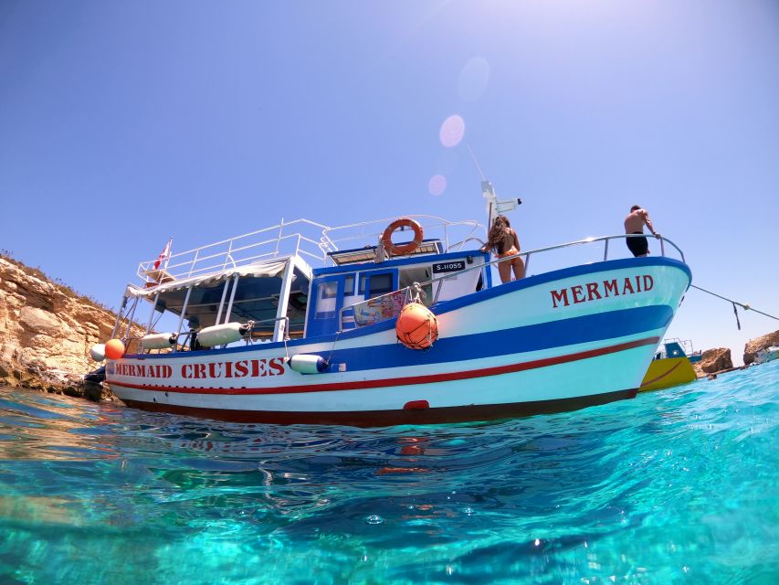 St. Paul's Bay: Blue Lagoon, Comino & Gozo with Bus Tour - The crew, boat, and onboard practicalities
