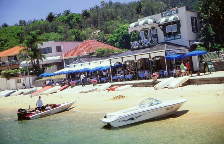 Sydney: Hop-on Hop-off Harbour Cruise with Commentary - Manly offers beaches, cafés, and a change of pace