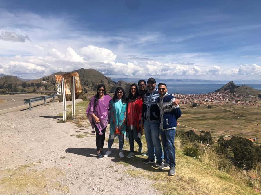 Titicaca Lake: Highlights Tour from La Paz by Bus - Boarding the shared boat on Lake Titicaca