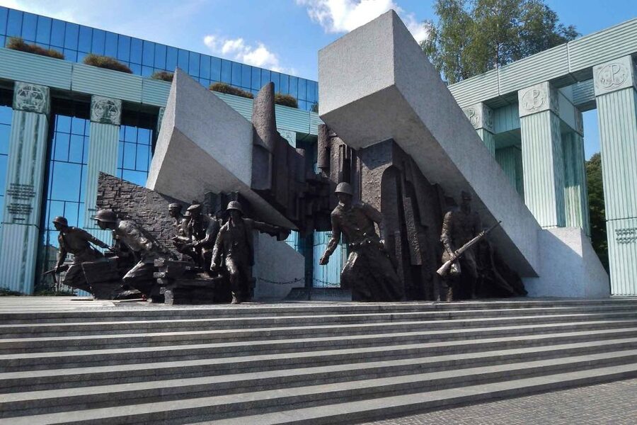 Warsaw: WWII Private Tour by Retro Minibus with Hotel Pickup - Archival photographs turn streets into evidence