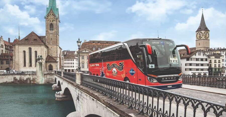Zurich: City Bus Tour with Audio Guide and Lake Cruise - Old Town churches and the 15-minute photo stop