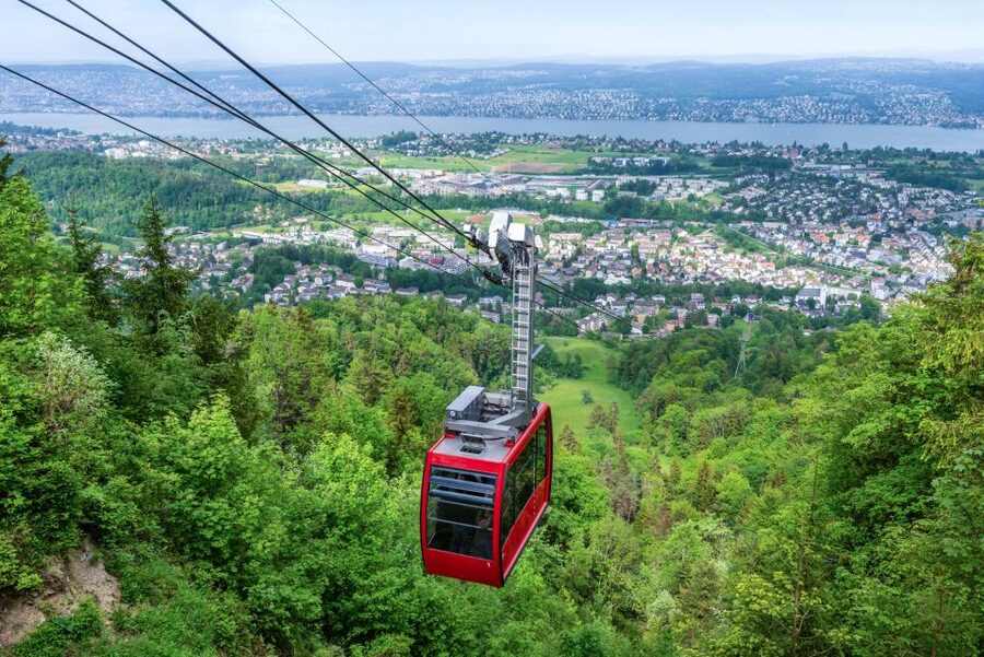 Zurich: City Highlights Tour by Bus, Cable Car, and Ferry - Zurich in half a day, from church clocks to Alpine peaks